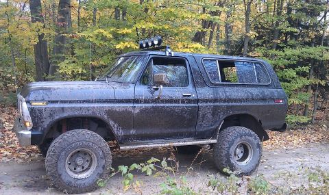 1979 Ford Bronco - This lifted 1978 Ford Bronco is shown in a wooded area during autumn.