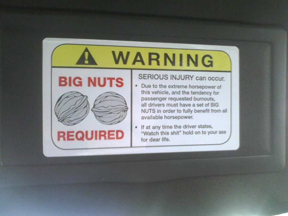 Sun visor warning sticker with "BIG NUTS REQUIRED" and humorous text about horsepower