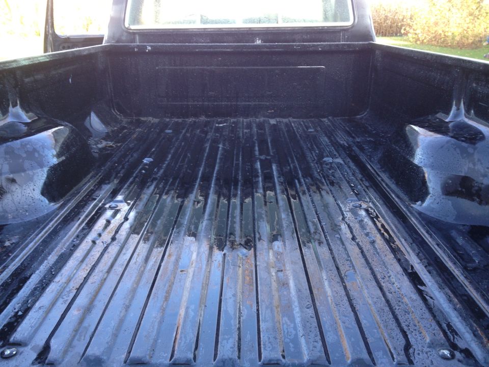 1979 Ford F-350 truck bed interior, showing ribbed metal floor and sides