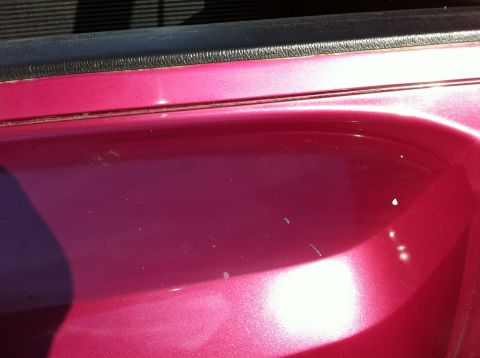 1992 Ford F-150 - Rear fender starting to peel. It is the newest paint on the truck too...
