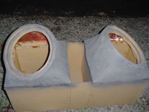 1999 Ford Taurus - Custom speaker box with two openings, likely for car audio installation.