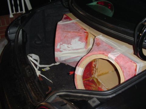 1999 Ford Taurus - Custom speaker box installation in the trunk of a vehicle.
