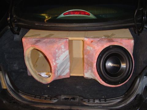 1999 Ford Taurus - Custom subwoofer box with a Premier speaker in the trunk of a car.
