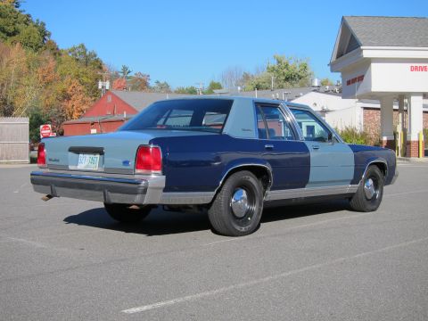 1991 Ford LTD Crown Victoria - Rear view of a 1991 Ford Crown Victoria LTD with a two-tone paint job.