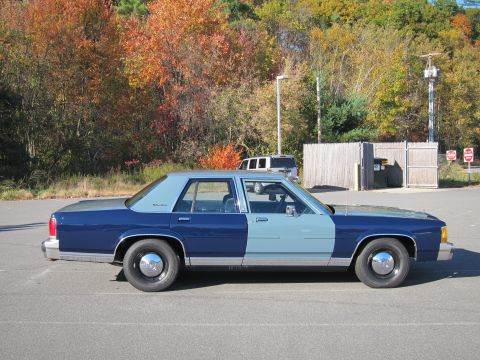 1991 Ford LTD Crown Victoria - This 1991 Ford Crown Victoria LTD is seen from the side, a distinctive two-tone blue paint scheme.