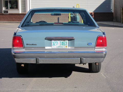 1991 Ford LTD Crown Victoria - Rear view of a light blue 1991 Ford Crown Victoria LTD sedan with a New Hampshire license plate.