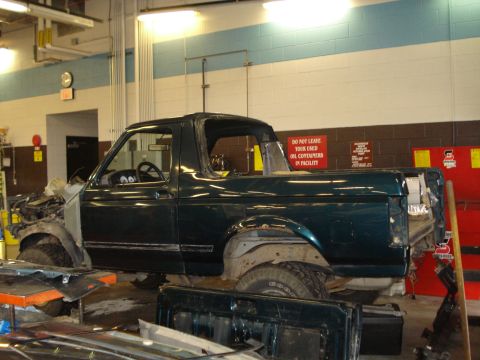 1994 Ford Bronco - This 1994 Ford Bronco is undergoing repairs or modifications in a workshop environment.