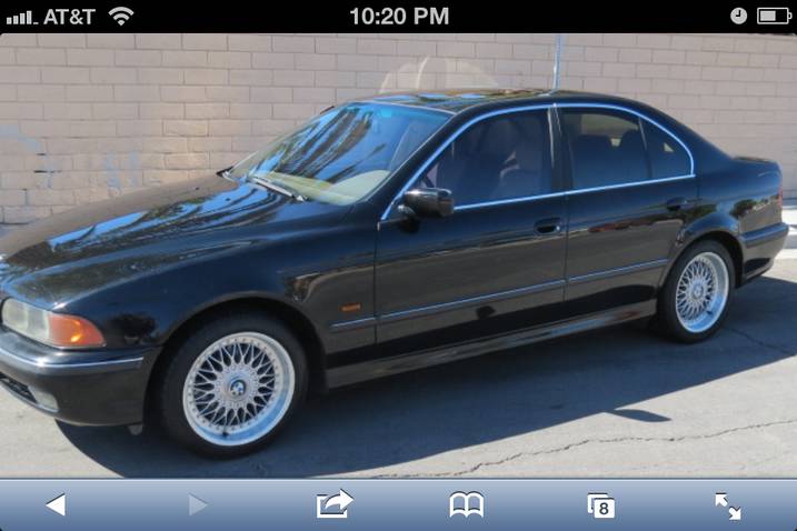 1999 BMW 5 Series sedan, black, side profile view