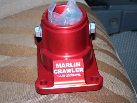 1988 Suzuki Samurai - A red Marlin Crawler part is shown, with text and a phone number visible on its label.