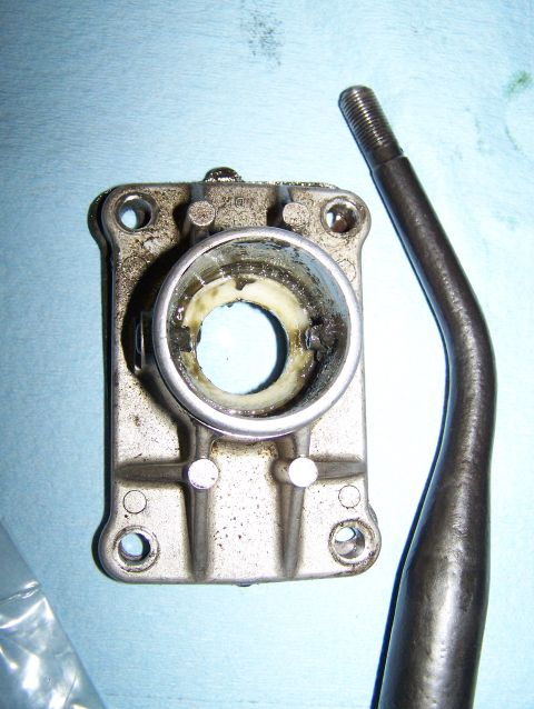 1988 Suzuki Samurai - Close-up of disassembled transmission shifter components, showing the lever and housing.