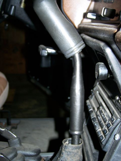 1988 Suzuki Samurai - Close-up interior view of a vehicle's dashboard and gear shifter, with a website watermark visible.