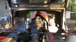 1978 Ford Bronco - This vehicle's interior is exposed, revealing the engine and frame during what appears to be a restoration or modification project.