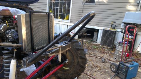 1978 Ford Bronco - This vehicle appears to be undergoing modifications with its engine and radiator exposed.