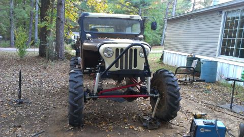 1978 Ford Bronco - This heavily modified Jeep CJ-5 features oversized tires and a custom front bumper, suggesting off-road capabilities.