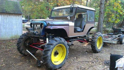 1978 Ford Bronco - This heavily modified Jeep CJ features oversized tractor tires and a custom body, not matching the 1978 Ford Bronco registry claim.