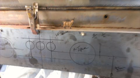 1978 Ford Bronco - A metal panel has layout marks and a small goat figurine is perched on the edge.