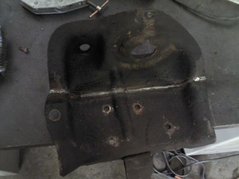 1993 Ford F-150 - This is a welded metal bracket, likely a replacement part, with several mounting holes visible.