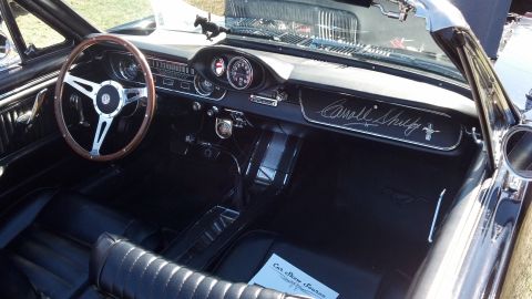 2007 Ford Mustang - The interior of a classic 1965 Shelby Mustang convertible, Carroll Shelby's signature on the dashboard.