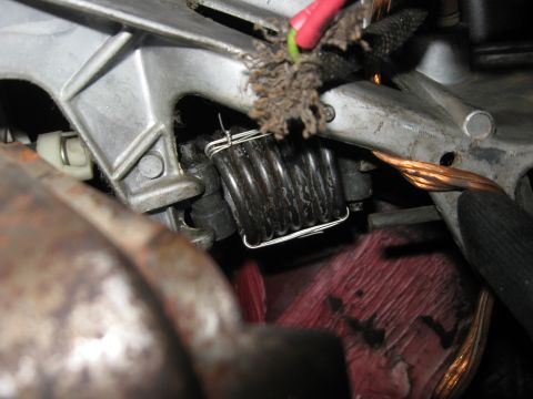 1981 Ford Bronco - Back in place. One end goes into a slot on the pedal bracket and the other end goes into the fork on the end of the clutch rod. It's easies…