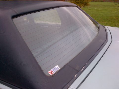 2001 Ford Crown Victoria - Car's rear window and soft top show a National Street Rod Association sticker.
