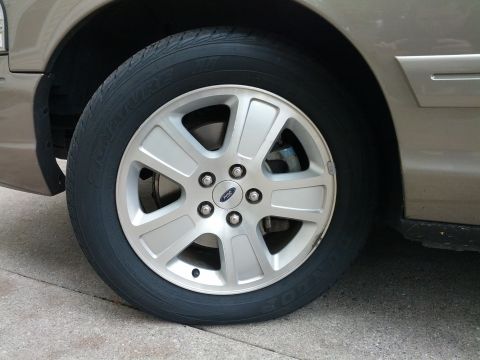 2007 Ford Crown Victoria - Dunlop Signature II in the stock 235/55/17 size.