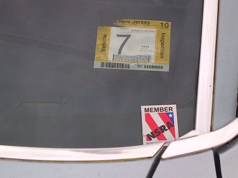 2001 Ford Crown Victoria - A New Jersey inspection sticker and an NSRA member sticker are affixed to the vehicle's windshield.