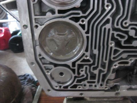 1994 Ford Bronco - The pin on the reverse servo must engage the reverse band. If it doesn't a screwdriver can be placed in the hole and used to move the band…