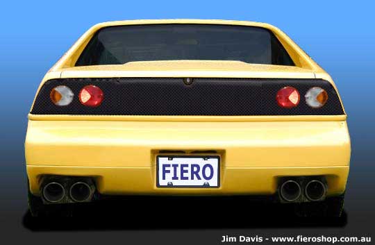 Yellow sports car rear with dual exhaust and FIERO license plate