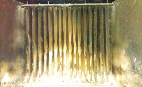 1980 Ford Bronco - Close-up view of corroded radiator fins, likely from an older vehicle.