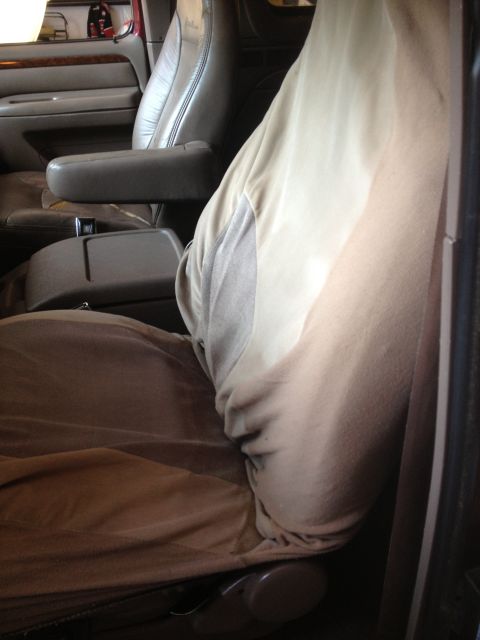1996 Ford Bronco - Interior view of a 1996 Ford Bronco, highlighting the leather seats and center console.