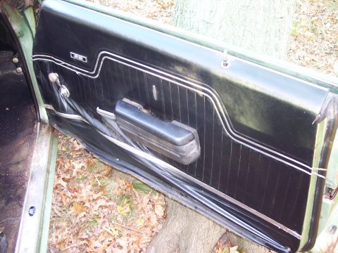 1970 Chevrolet Chevelle - Interior door panel detail, likely from a 1970s muscle car.