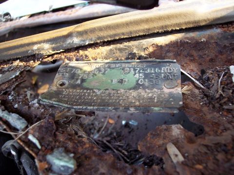 1970 Chevrolet Chevelle - A rusted Fisher body tag indicates a 1970 Chevrolet Chevelle, though the vehicle itself is not visible.
