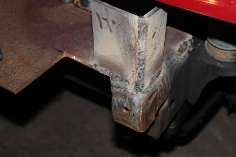 1990 Ford Bronco - Custom welded bracket on vehicle frame, likely for bumper modification.