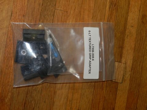 1996 Ford Bronco - Bagged grip adapter parts are shown, with a label indicating the part number and description.