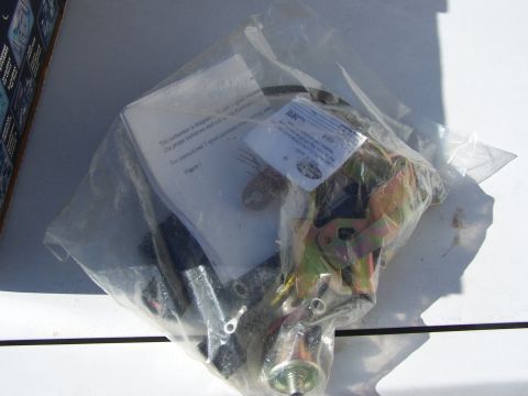 1991 Ford LTD Crown Victoria - Plastic-wrapped automotive part with visible instructions and label.