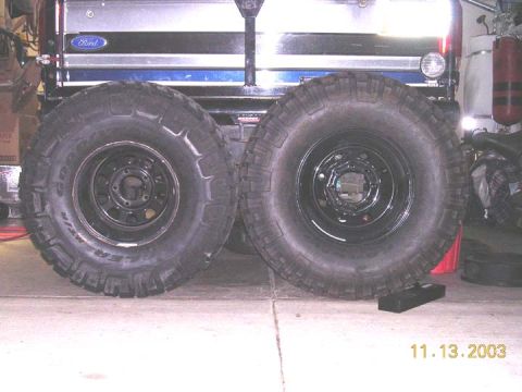 1994 Ford Bronco - brand new 35 on 15x10 next to a brand new 37 on a 17x9