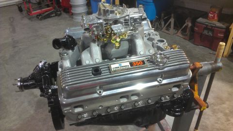 1973 Chevrolet Camaro - Chevrolet 350 engine on stand, chrome valve covers and a Holley carburetor.