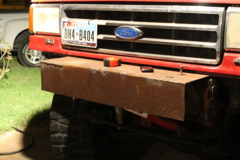 1990 Ford Bronco - Custom steel bumper fabrication on a 1990 Ford Bronco, showing the front grille and Texas license plate.