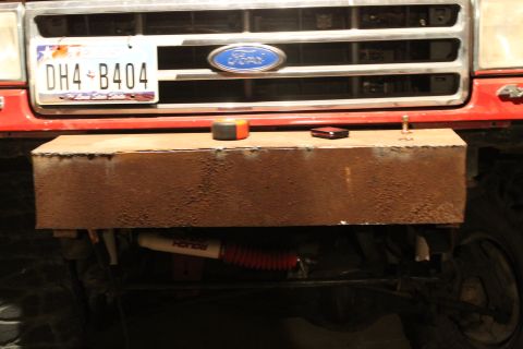1990 Ford Bronco - Custom front bumper installed on a 1990 Ford Bronco, visible Ford emblem on the grille.