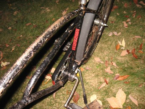1994 Ford Bronco - A close-up view of a bicycle's frame and chain guard, showing wear and tear.