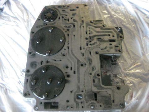1994 Ford Bronco - This is a transmission valve body, a complex component with many passages and ports.