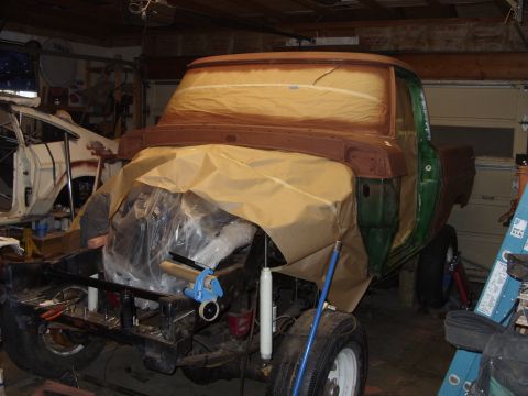 1967 Ford F-250 - Truck body masked for painting, engine exposed, in garage with another vehicle undergoing restoration.