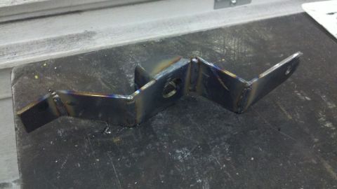 1978 Ford Bronco - A custom metal bracket is shown, likely for automotive use, with visible weld marks.