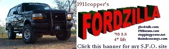 Black Ford Bronco with a brush guard and custom graphics, lifted with off-road tires