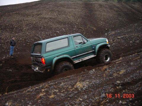 1996 Ford Bronco - Off-road adventure in a 1996 Ford Bronco navigating challenging terrain.