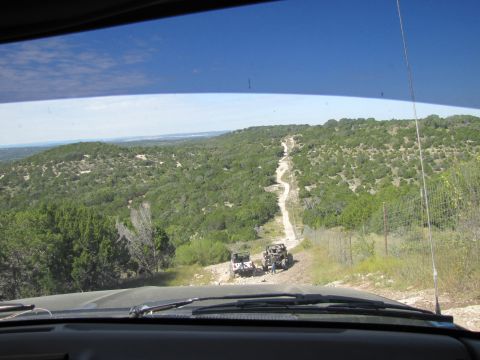 1995 Ford Bronco - Off-roading adventure on a scenic dirt trail through the hills.