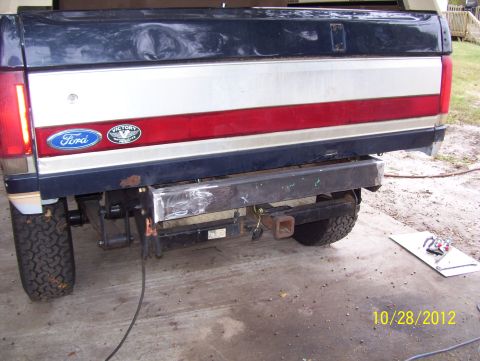 1990 Ford Bronco - The rear of a 1990 Ford Bronco shows off its two-tone paint and a newly installed custom bumper.