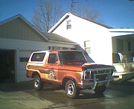 1978 Ford Bronco - This 1978 Ford Bronco is parked in front of a house and garage.