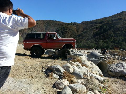1978 Ford Bronco - 1978 Ford Bronco tackling a challenging rocky terrain on an off-road adventure.
