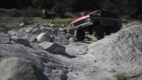 1978 Ford Bronco - This vehicle navigates a challenging rocky terrain.